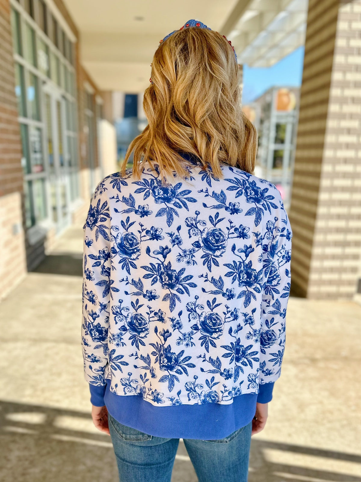 Floral University of Kansas Sweatshirt - Amelia's Boutique